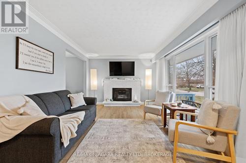 8848 Banting Avenue, Niagara Falls (223 - Chippawa), ON - Indoor Photo Showing Living Room With Fireplace