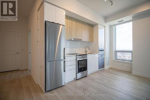 2507 - 30 Upper Mall Way, Vaughan, ON - Indoor Photo Showing Kitchen With Stainless Steel Kitchen