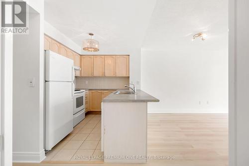 610 - 50 Brian Harrison Way, Toronto, ON - Indoor Photo Showing Kitchen With Double Sink