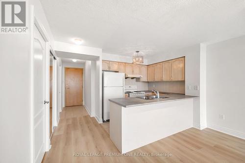 610 - 50 Brian Harrison Way, Toronto, ON - Indoor Photo Showing Kitchen With Double Sink