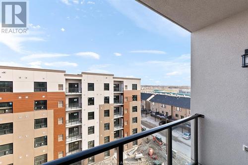 716 Brownstone Unit# 208, Tecumseh, ON - Outdoor With Balcony With Exterior