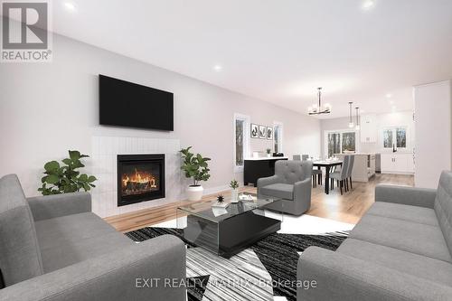 1335 Fribourg Street S, Russell, ON - Indoor Photo Showing Living Room With Fireplace