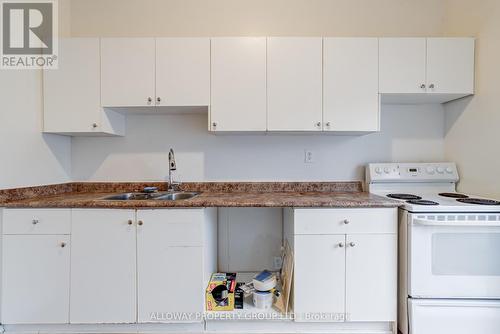 1059 Bathurst Street, Toronto, ON - Indoor Photo Showing Kitchen With Double Sink