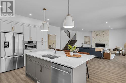 981 Lochness Street, Kelowna, BC - Indoor Photo Showing Kitchen With Double Sink With Upgraded Kitchen