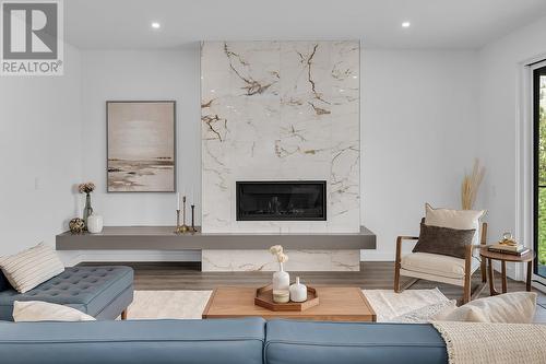 981 Lochness Street, Kelowna, BC - Indoor Photo Showing Living Room With Fireplace