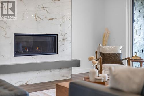 981 Lochness Street, Kelowna, BC - Indoor Photo Showing Living Room With Fireplace