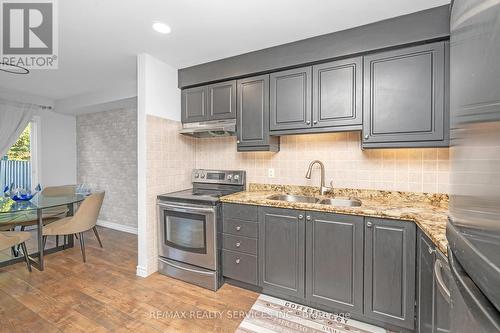 25 Westvillage Drive, Hamilton, ON - Indoor Photo Showing Kitchen With Double Sink