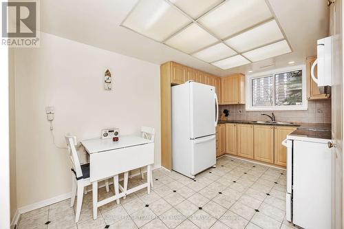 109 - 1705 Playfair Drive, Ottawa, ON - Indoor Photo Showing Kitchen With Double Sink