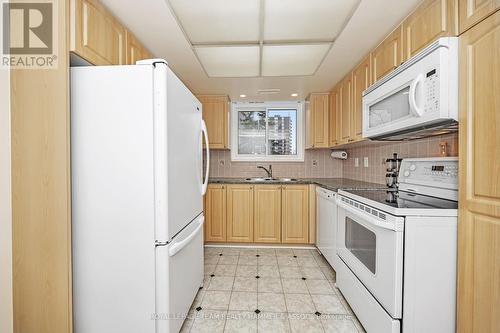 109 - 1705 Playfair Drive, Ottawa, ON - Indoor Photo Showing Kitchen With Double Sink