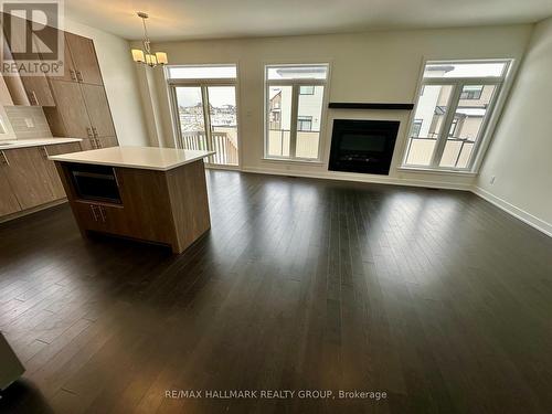 724 Odyssey Way, Ottawa, ON - Indoor Photo Showing Living Room With Fireplace