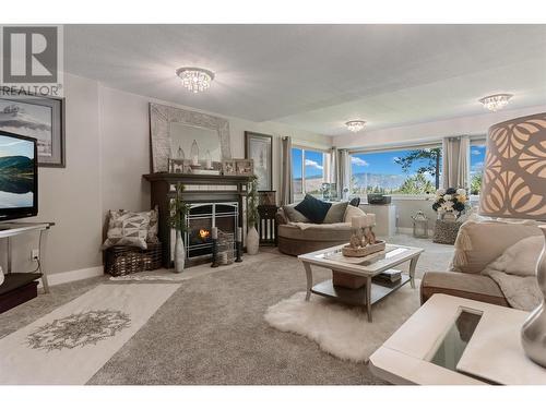 127 Westridge Drive, Princeton, BC - Indoor Photo Showing Living Room With Fireplace