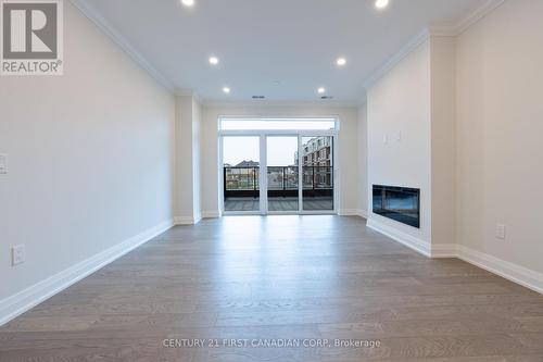 201 - 1975 Fountain Grass Drive, London, ON - Indoor Photo Showing Other Room With Fireplace