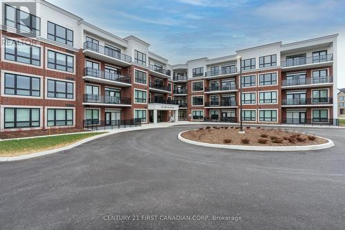 201 - 1975 Fountain Grass Drive, London, ON - Outdoor With Balcony With Facade