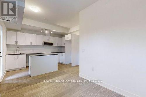 147 - 1075 Douglas Mccurdy Comm, Mississauga, ON - Indoor Photo Showing Kitchen