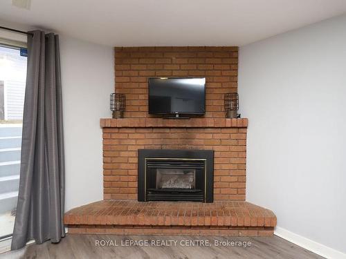 18 Wright St, Brampton, ON - Indoor Photo Showing Living Room With Fireplace