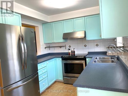 119 - 5260 Mcfarren Boulevard, Mississauga, ON - Indoor Photo Showing Kitchen With Double Sink