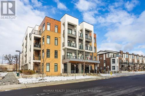 204 - 120 Canon Jackson Drive, Toronto, ON - Outdoor With Facade