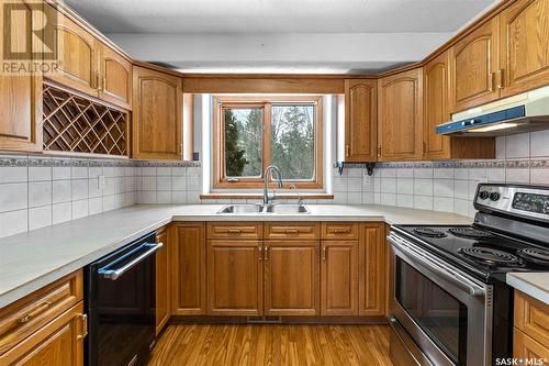 8 Chemin Bellevue Road, Battleford, SK - Indoor Photo Showing Kitchen With Double Sink