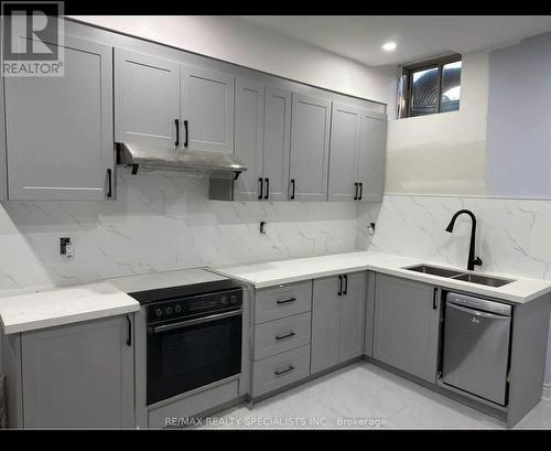 Bsmt - 22 Edenvalley Road, Brampton, ON - Indoor Photo Showing Kitchen With Double Sink