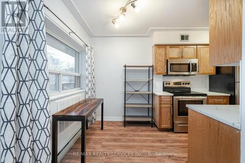 203 - 11 Woodman Drive S, Hamilton, ON - Indoor Photo Showing Kitchen With Stainless Steel Kitchen