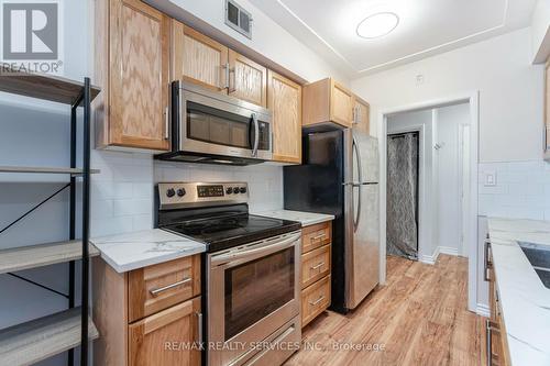 203 - 11 Woodman Drive S, Hamilton, ON - Indoor Photo Showing Kitchen With Stainless Steel Kitchen