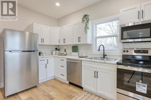 4537 Westchester Bourne, Thames Centre, ON - Indoor Photo Showing Kitchen With Double Sink