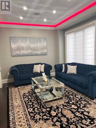 25 Christine Elliott Avenue, Whitby, ON - Indoor Photo Showing Living Room