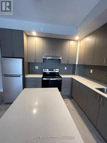 1706 - 3220 William Colston Avenue, Oakville, ON - Indoor Photo Showing Kitchen With Upgraded Kitchen