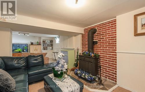 66 Mcmurchy Avenue N, Brampton, ON - Indoor Photo Showing Living Room With Fireplace