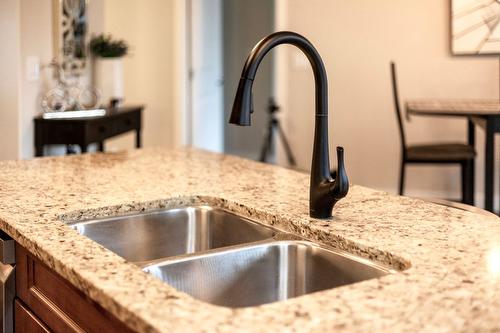 6304-4026 Pritchard Drive, West Kelowna, BC - Indoor Photo Showing Kitchen With Double Sink