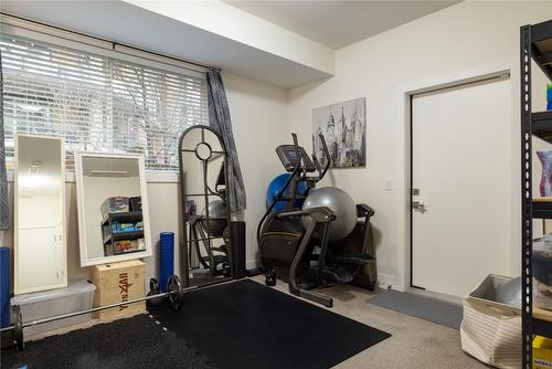 49-300 Drysdale Boulevard, Kelowna, BC - Indoor Photo Showing Gym Room