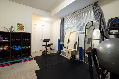 49-300 Drysdale Boulevard, Kelowna, BC - Indoor Photo Showing Gym Room