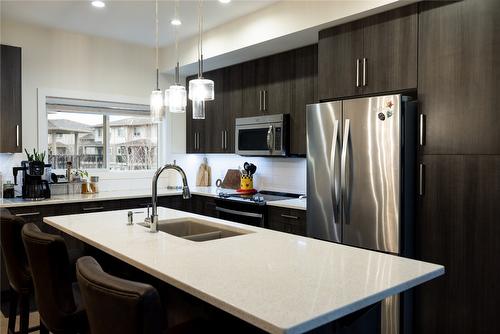 49-300 Drysdale Boulevard, Kelowna, BC - Indoor Photo Showing Kitchen With Double Sink With Upgraded Kitchen