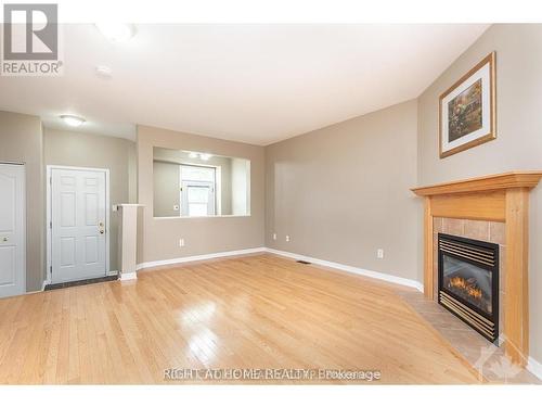 557 Aberfoyle Circle, Ottawa, ON - Indoor With Fireplace