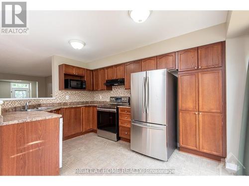 557 Aberfoyle Circle, Ottawa, ON - Indoor Photo Showing Kitchen With Double Sink