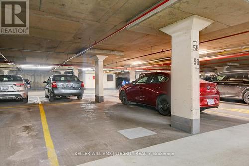 707 - 1705 Playfair Drive, Ottawa, ON - Indoor Photo Showing Garage