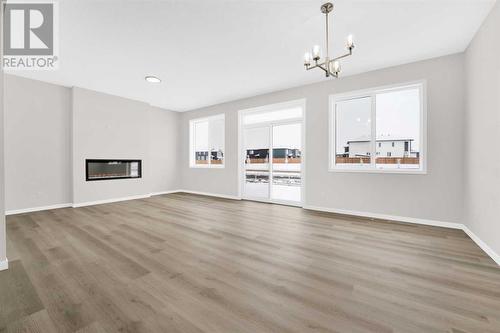 317 Corner Glen Way Ne, Calgary, AB - Indoor Photo Showing Living Room With Fireplace