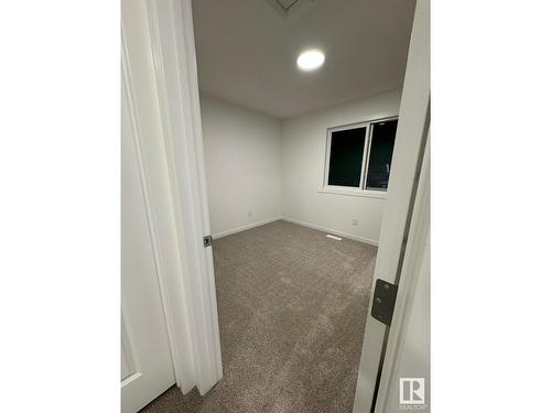 #115 1025 Secord Promenade Nw Nw, Edmonton, AB - Indoor Photo Showing Other Room