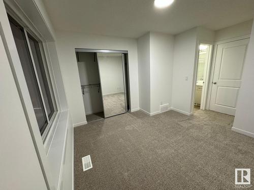 #115 1025 Secord Promenade Nw Nw, Edmonton, AB - Indoor Photo Showing Other Room