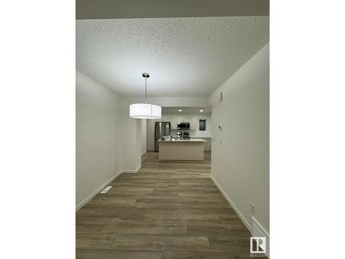 #115 1025 Secord Promenade Nw Nw, Edmonton, AB - Indoor Photo Showing Other Room