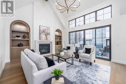 2040 56 Avenue Sw, Calgary, AB - Indoor Photo Showing Living Room With Fireplace