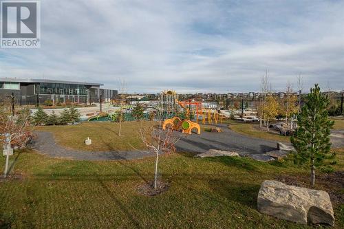 Playground - 1308, 350 Livingston Common Ne, Calgary, AB - Outdoor With View