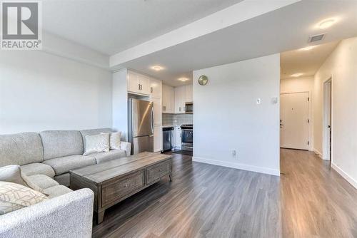 Living Room - 1308, 350 Livingston Common Ne, Calgary, AB - Indoor Photo Showing Living Room