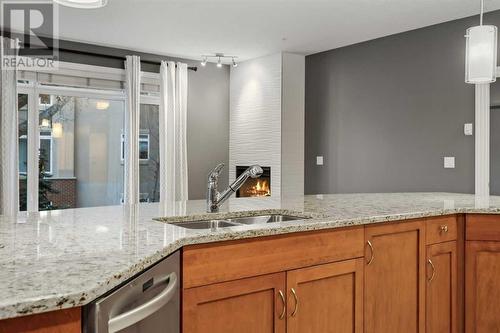 8201, 14 Hemlock Crescent Sw, Calgary, AB - Indoor Photo Showing Kitchen With Double Sink