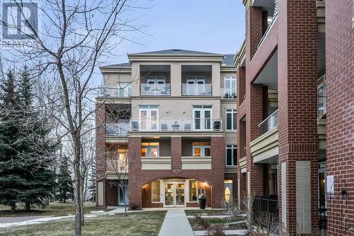 8201, 14 Hemlock Crescent Sw, Calgary, AB - Outdoor With Facade