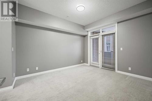 8201, 14 Hemlock Crescent Sw, Calgary, AB - Indoor Photo Showing Other Room