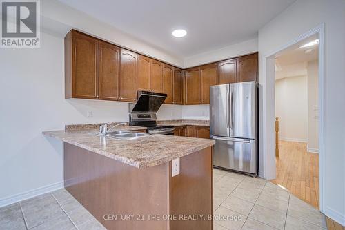 69 James Govan Drive, Whitby, ON - Indoor Photo Showing Kitchen With Double Sink