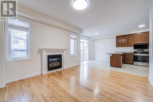 69 James Govan Drive, Whitby, ON - Indoor Photo Showing Other Room With Fireplace