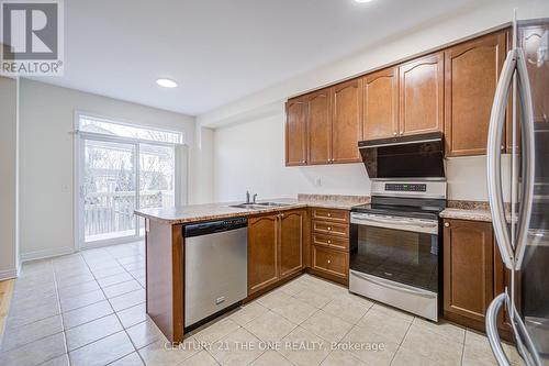 69 James Govan Drive, Whitby, ON - Indoor Photo Showing Kitchen With Double Sink