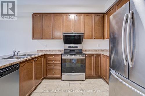 69 James Govan Drive, Whitby, ON - Indoor Photo Showing Kitchen With Double Sink